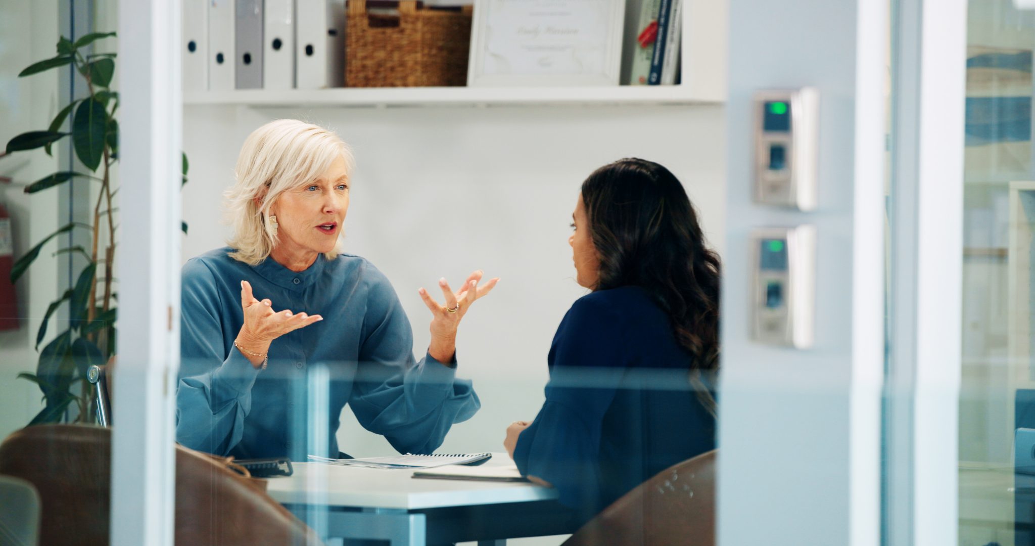 Serious, HR and meeting with employee, talking and discussion for poor performance and journalist. Error, women and explaining to worker, conversation and policy violations of company or disciplinary